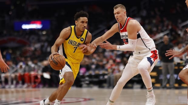 Malcolm Brogdon attacking